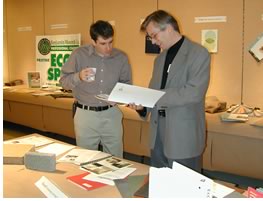 Steve Darnall, HOK Seattle, and Erik Anderson, HOK Chicago, take part in a materials fair, which featured displays and information about a range of energy-efficient and environmentally responsible building materials.