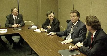 DNC chairman McAuliffe, second from right, exuded energy and humor as he laid out Democratic Party strategy to, from left, Koonce, Chong, and Penney.