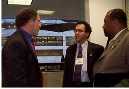 Senator Jon Corzine, left, speaks with Ric Bell, FAIA, executive director of AIA New York, and Bill Brown, AIA, president of AIA New Jersey.