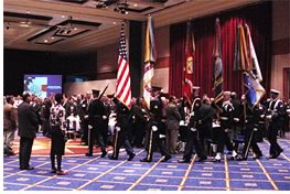 The Joint Services Color Guard leads off Thursday's presentation of Government Affairs Day. (photo by M. David Williams)
