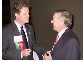 North Carolina Rep. Ed McMahan (R-Charlotte) chats with Thom Penney, FAIA, at the ArchiPAC reception at the 2002 national convention in Charlotte.  Members should write and phone their elected representatives, component executives and AIA national staff urge, if they want to have an effect on legislative proposals.