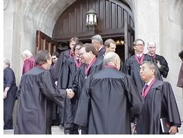 The newly elected fellows and honorary fellows of the Class of 2002 celebrate their investiture outside First United Methodist Church in Charlotte. The May 10 ceremony, held during the AIA convention, marked the 50th anniversary of the College of Fellows. Photo by Tracy Ostroff