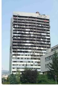 A building in shambles, an all too familiar sight in Bosnia-Herzegovina.