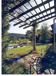 This trellis filters light into the attached living room of this house designed by Cass Calder Smith Architecture, thus contributing to "Creating Rooms, Outside and In."