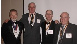 (l. to r.) John Maudlin-Jeronimo, FAIA, 2002 chapter president; Ralph D. Bennett, AIA; John F. Corkill Jr., AIA; and Roger K. Lewis, FAIA.