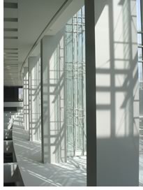 A glass façade allows convention-goers breath-taking views of the six distinct neighborhoods and monuments that surround the Convention Center. Photo by Peter Green, TVS.