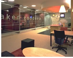 The Pillsbury Doughboy overlooks the sixth-floor conference room and elevator lobby kitchen.