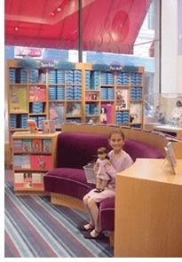 The store features plenty of places to pause and read American Girl stories.