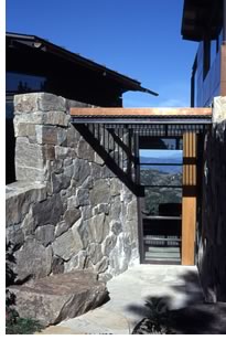 The Castle Pines, Colo., design, competed in 1999, is a series of low granite walls threaded into the hill forming the base of the house. The project received the 2000 Texas Society of Architects Design Award and the 2000 AIA San Antonio Design Award.