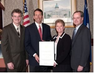 AIA South Carolina recently presented Gov. Mark Sanford with an Honorary Affiliate Membership for his support of issues affecting the architecture profession and the creation of a better built environment. From left to right are Mark Clancy, AIA, AIA/SC Government Affairs director, Sanford, Mary Beth Branham, AIA, AIA/SC president, and Eric Aichele, AIA, AIA/SC vice president/president elect.
