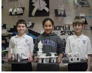 Summit Country Day School sixth graders Austin Leach, Tess Akgunduz, and Maxwell Bowdon with their designs for sacred spaces. 