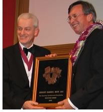 Jeremy Harris, Hon. AIA, accepts the Keystone Award from AAF Board of Regents Chair Norbert W. Young, FAIA, honoring Harris appreciation of architects and architecture as mayor of Honolulu.