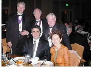 Guests of honor at the College of Fellows convocation dinner: (l. to r.) 2005 AIA President Douglas L Steidl, FAIA; AIA Gold Medalist Santiago Calatrava, FAIA; Mrs. Calatrava (seated); Barkley; and Leis. Photo courtesy of Jeanette Barkley.