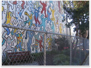 A Keith Haring Radiant Baby Mural graces a wall on the Concert Garden site.