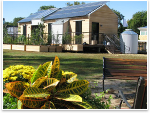 The rear of the Beau Soleil House. Its gabled roof is covered in solar panels. Photo courtesy of the University of Louisiana at Lafayette.