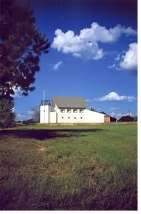 Mockbee’s Magee Church of Christ, Magee, Miss., blends “the reality of Southern suburbia mixing with the rural landscape.”