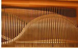 The magnificently built house organ, hand-built by the noted Orgelbau Klais of Bonn, Germany, boasts handmade tin pipes, gold leaf accents, and a wave design.